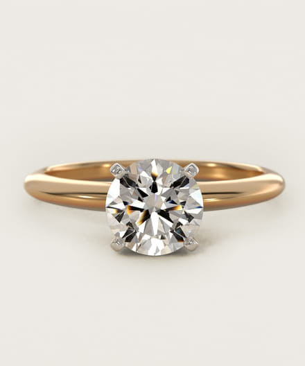 Classic Four Prong Solitaire Engagement Ring In 14K Yellow Gold